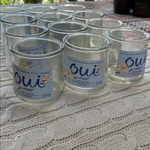 Oui Yogurt Glass Jars Set of 12 empty & clean. Great for storage and crafting
